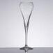 A clear Chef & Sommelier flute wine glass on a reflective surface.