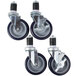 A set of four Eagle Group black and white polymer casters with rubber wheels.