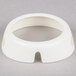 A white circular plastic collar with a hole in it.