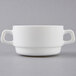 A white Arcoroc double handled bowl.