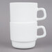 A stack of white Arcoroc tall cups with a white handle on top.