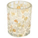 A Sterno light gold glass votive candle holder with a mosaic pattern.