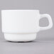 An Arcoroc white opal coffee cup with a handle.