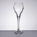 An Arcoroc Brio wine flute on a table.
