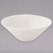 A Tuxton eggshell white china bowl with a tapered shape.