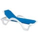 A white Grosfillex chaise lounge chair with blue sling fabric.
