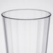 A WNA Comet clear fluted plastic cup.