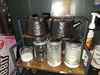 Our tea pot hanging out with their identical twin friends the sugar dispensers.