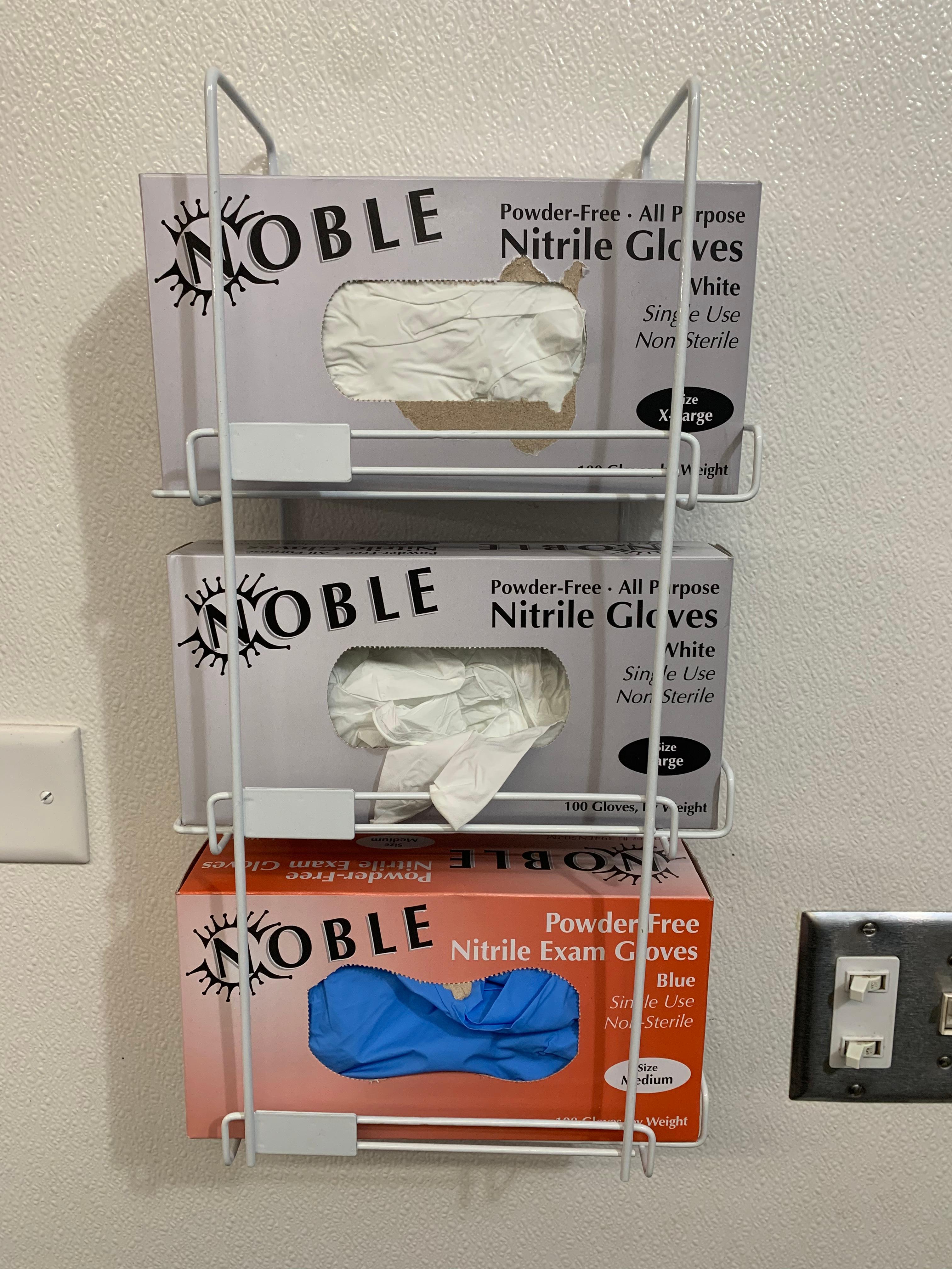 Fits nicely in the glove dispenser which holds slim and normal size glove boxes!