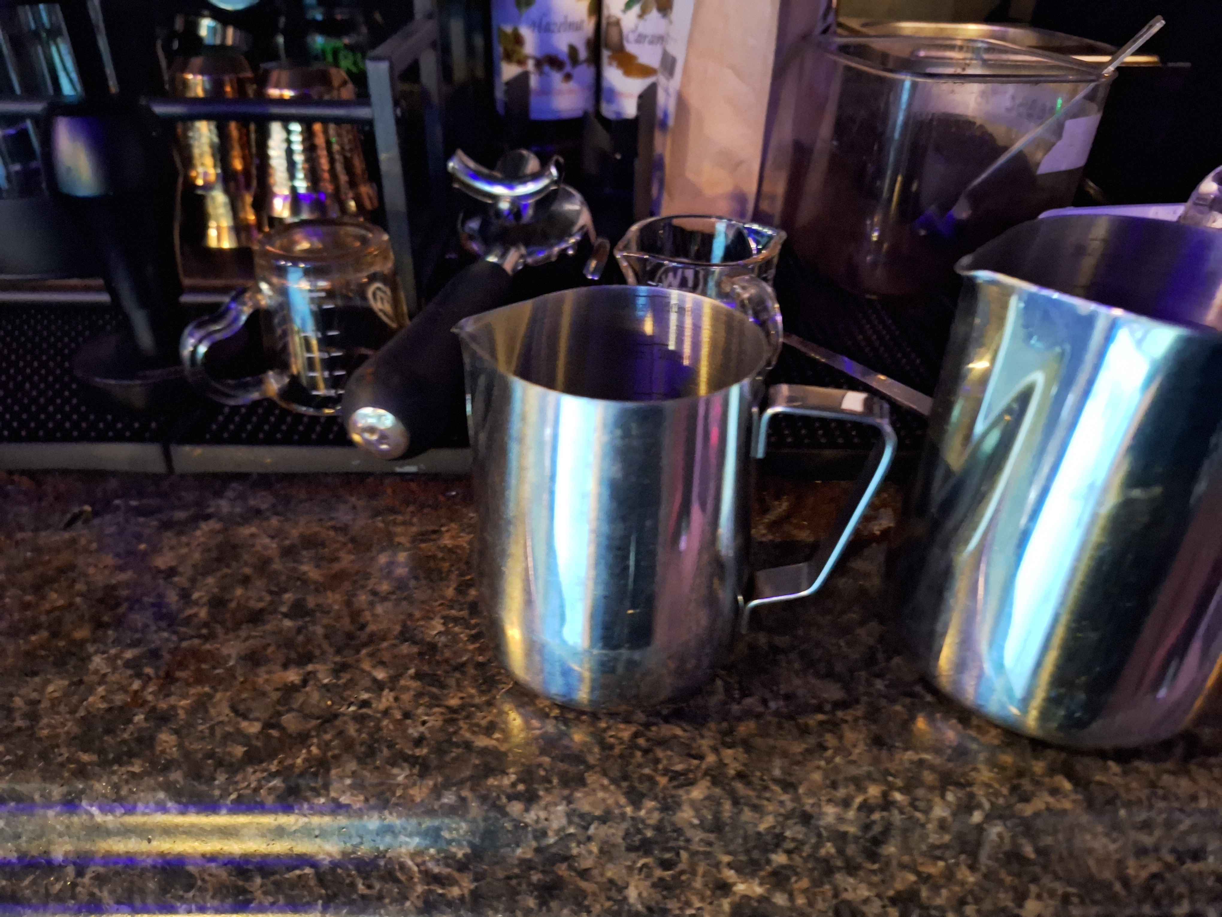 Our 12 oz frothing cup pictured next to his older brother, the 20 oz frothing cup.