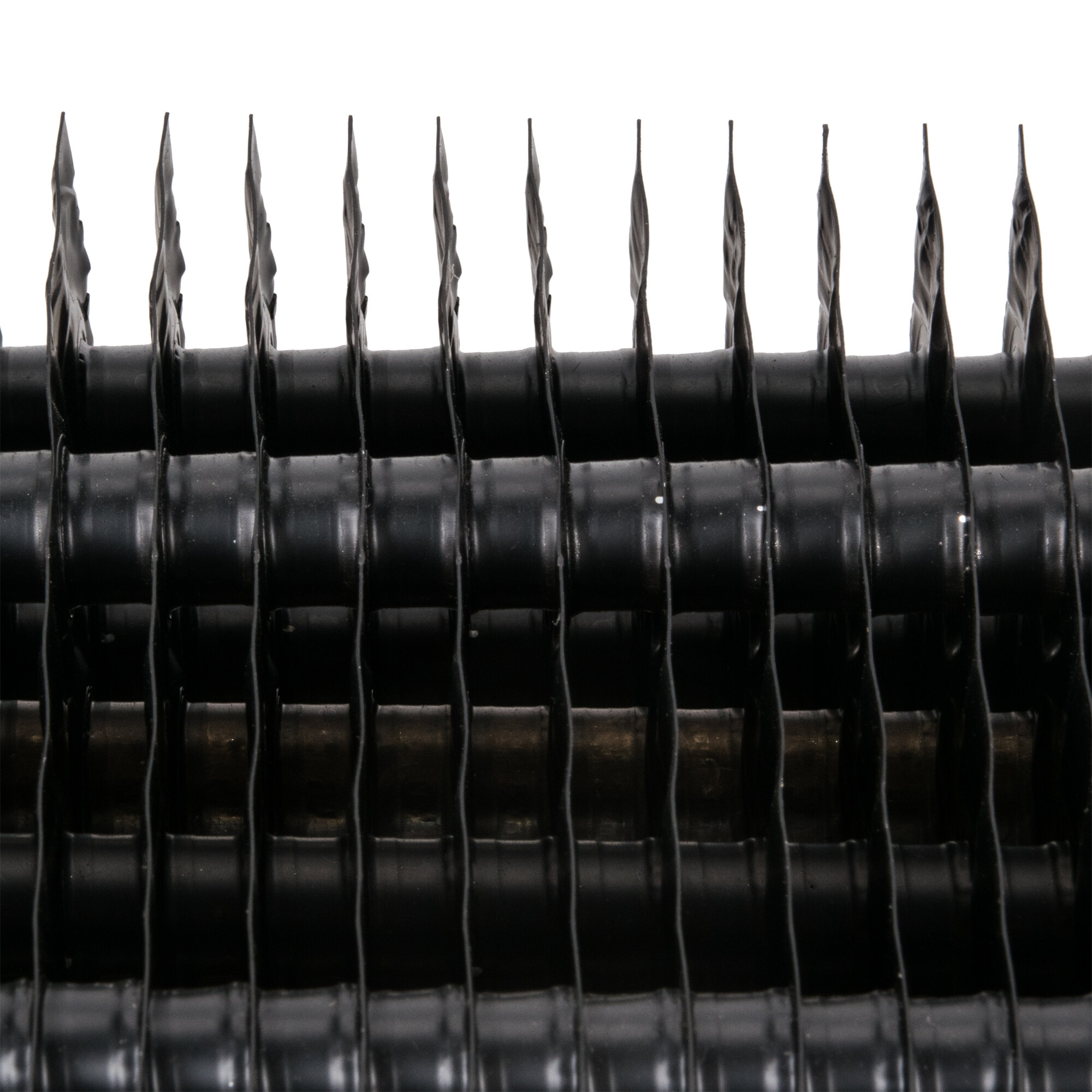 A close up of an Avantco evaporator coil. Black plastic blades are visible.