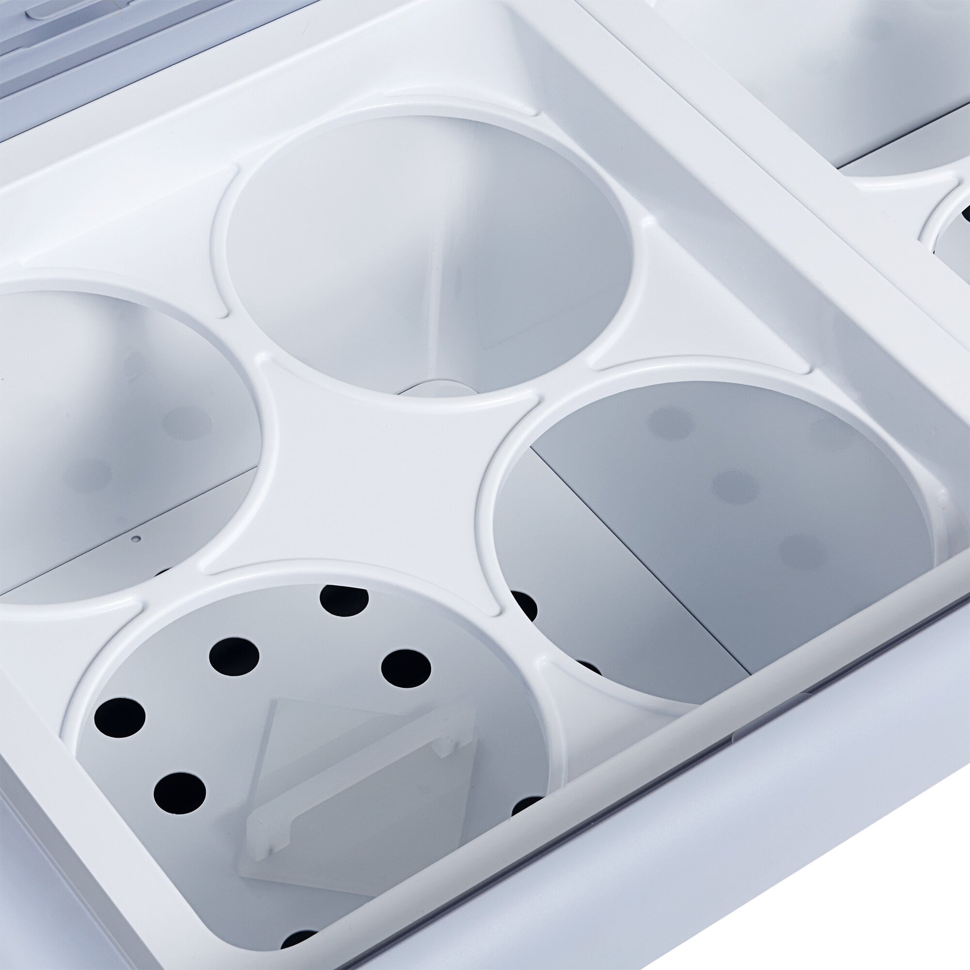An Avantco white ice cream dipping cabinet with curved sneeze guard and two holes.