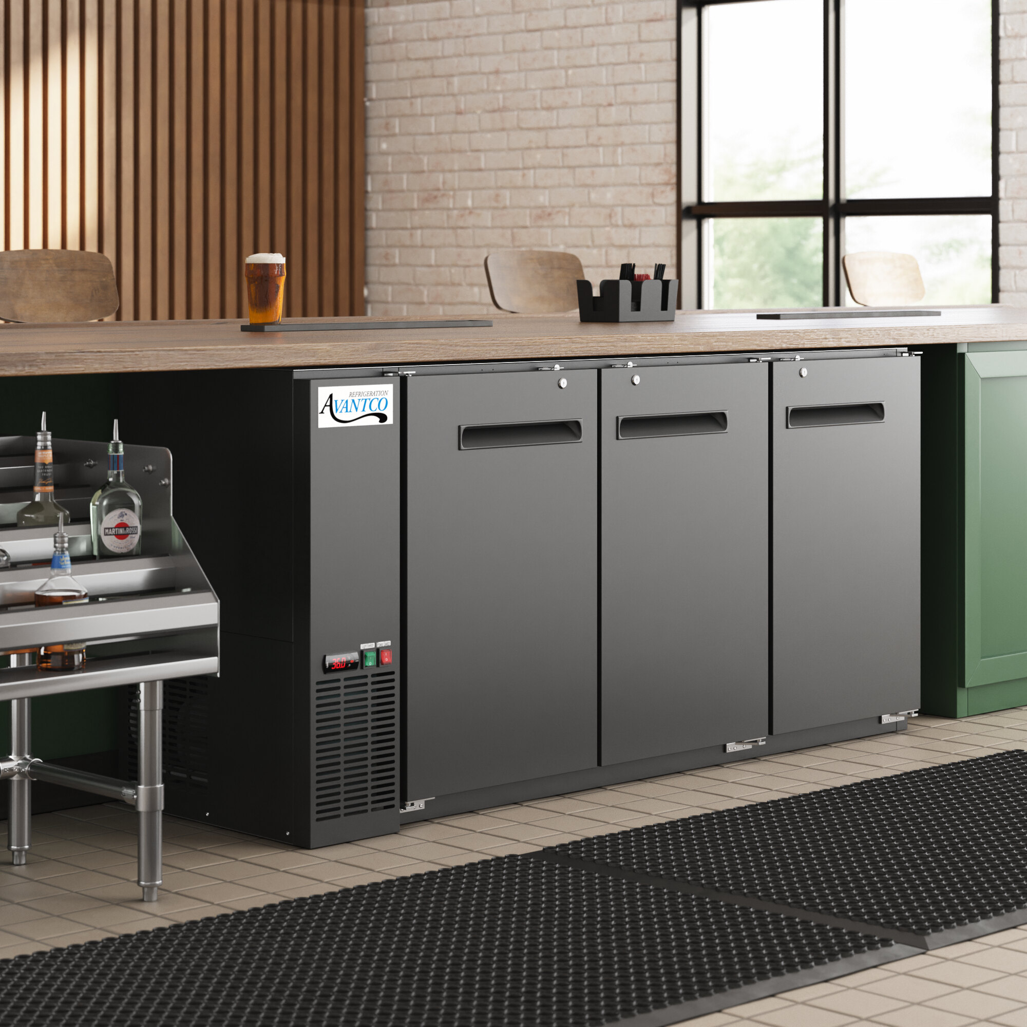 A black underbar height narrow solid door back bar refrigerator with a galvanized top and LED lighting.