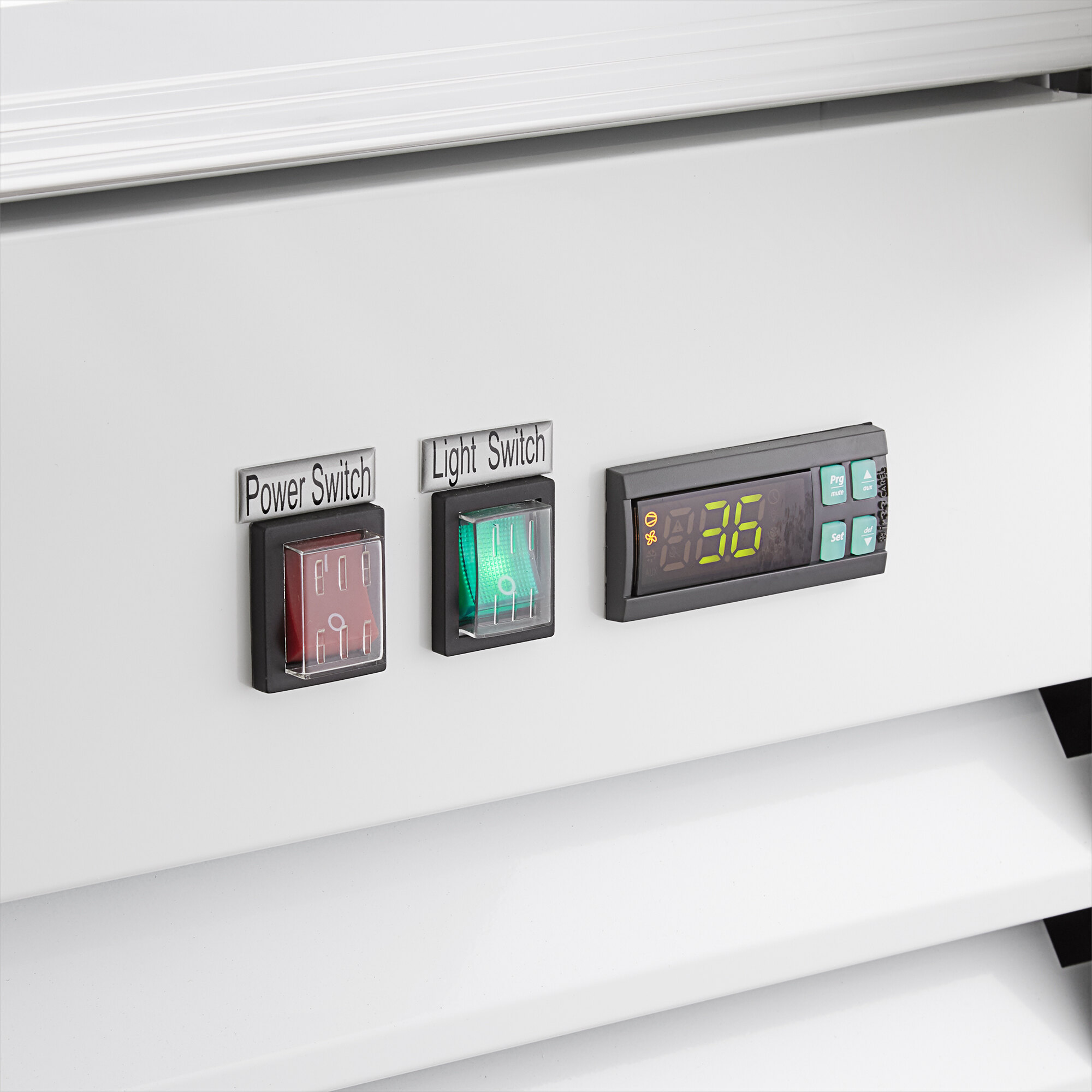The electronic control panel of a white Avantco ice merchandiser.