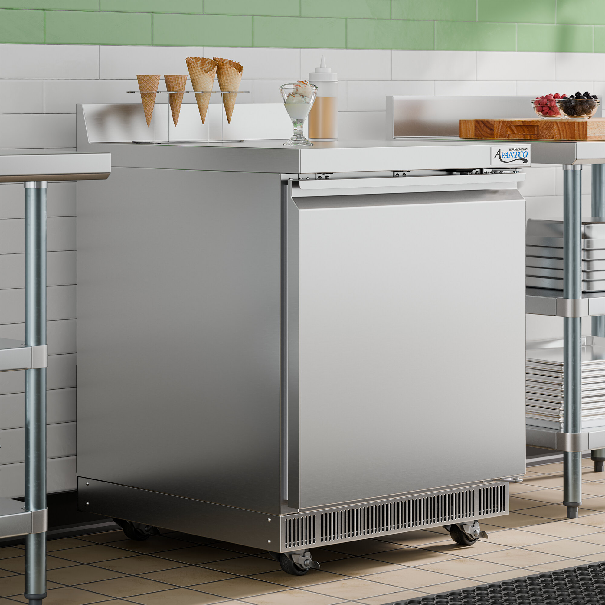 A stainless steel 27-inch front breathing worktop freezer with a 3 1/2-inch backsplash.