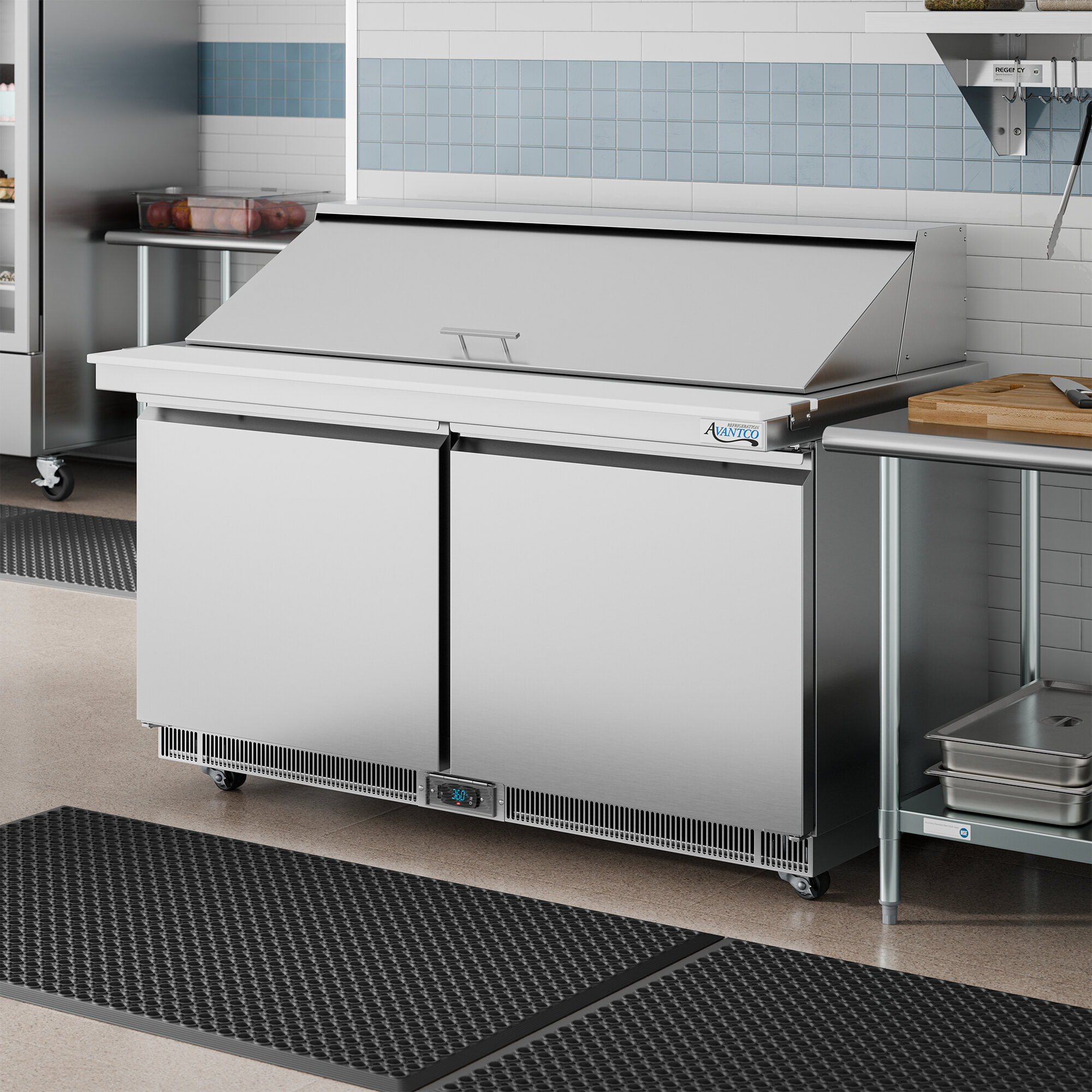 A stainless steel, two-door front-breathing mega top refrigerated sandwich prep table.