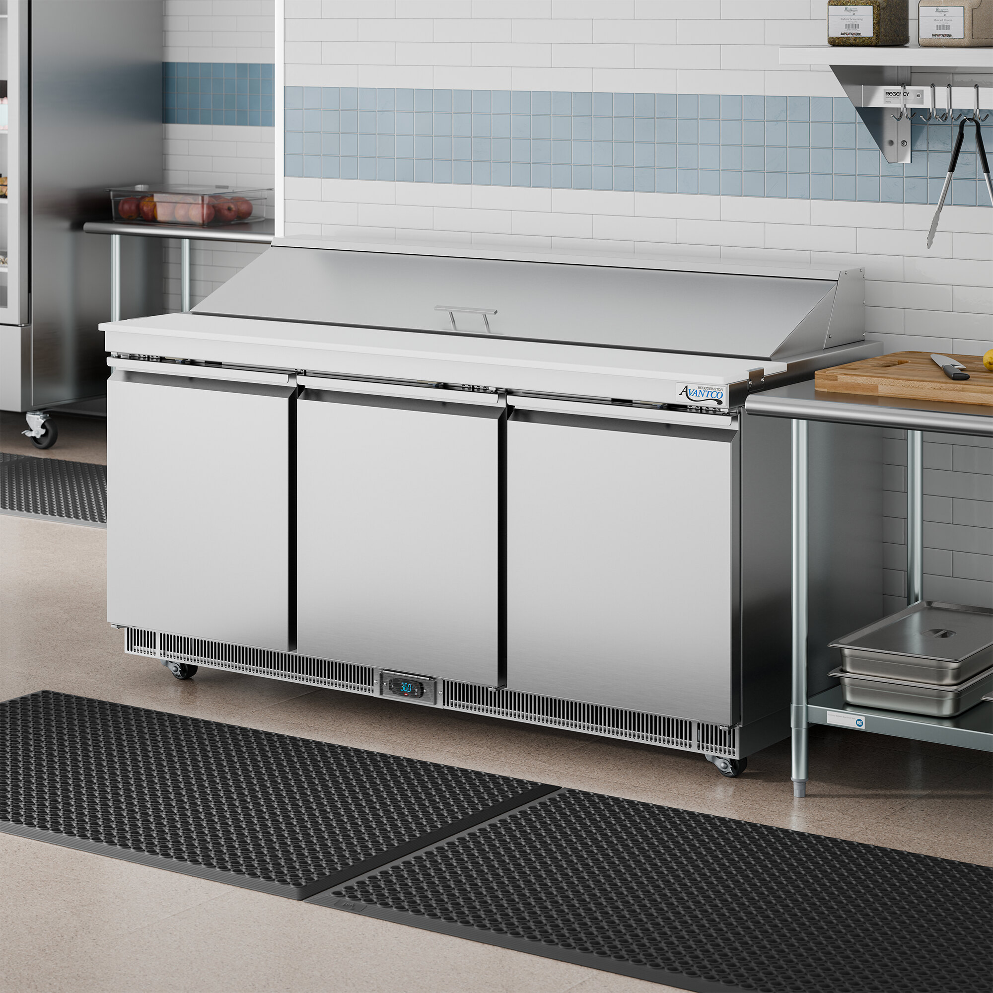 A large, stainless steel, three-door refrigerated sandwich prep table with a cutting top and WiFi-enabled controls.