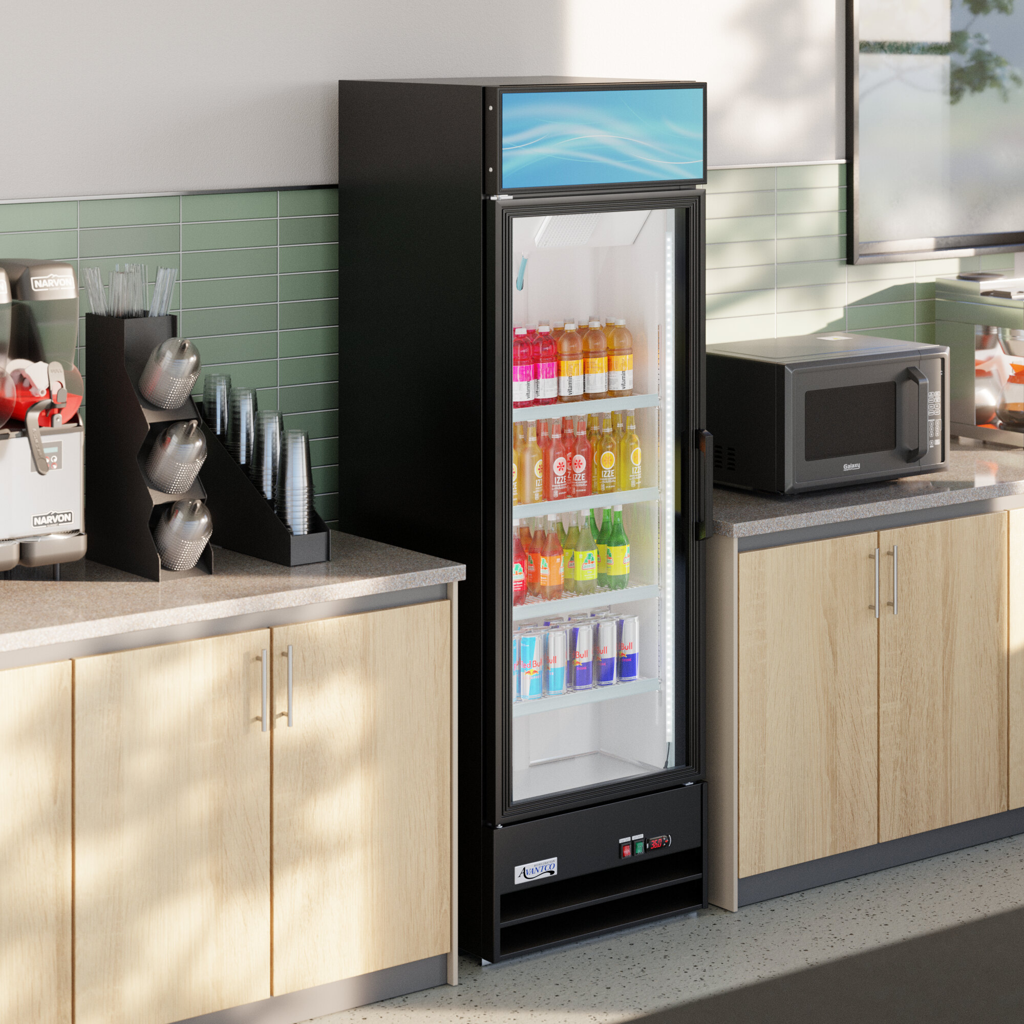 A black glass door merchandiser refrigerator with LED lighting, stocked with assorted beverages and positioned between countertops in a break room setting.