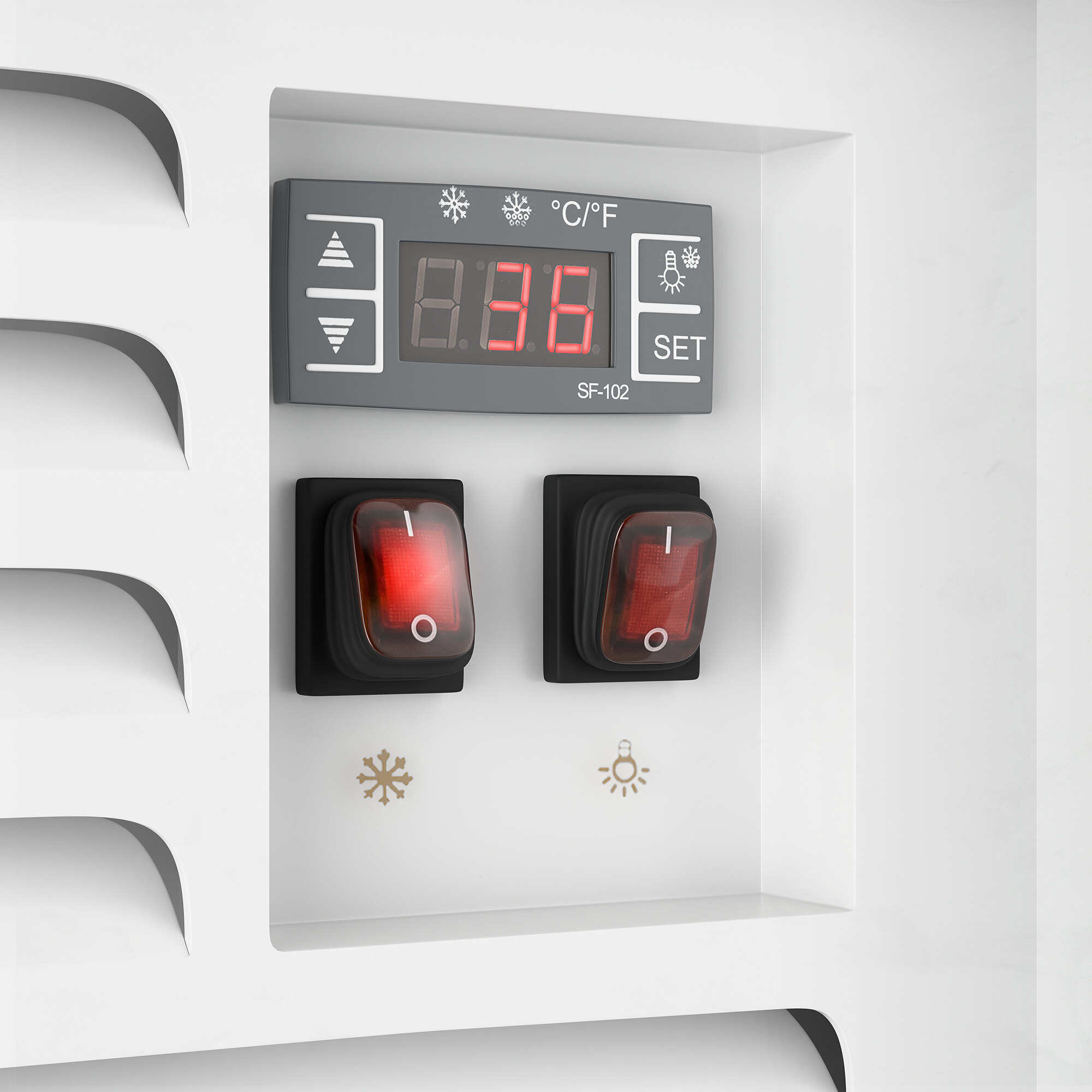 A control panel of a white refrigerated air curtain merchandiser with a digital temperature display and two red rocker switches.