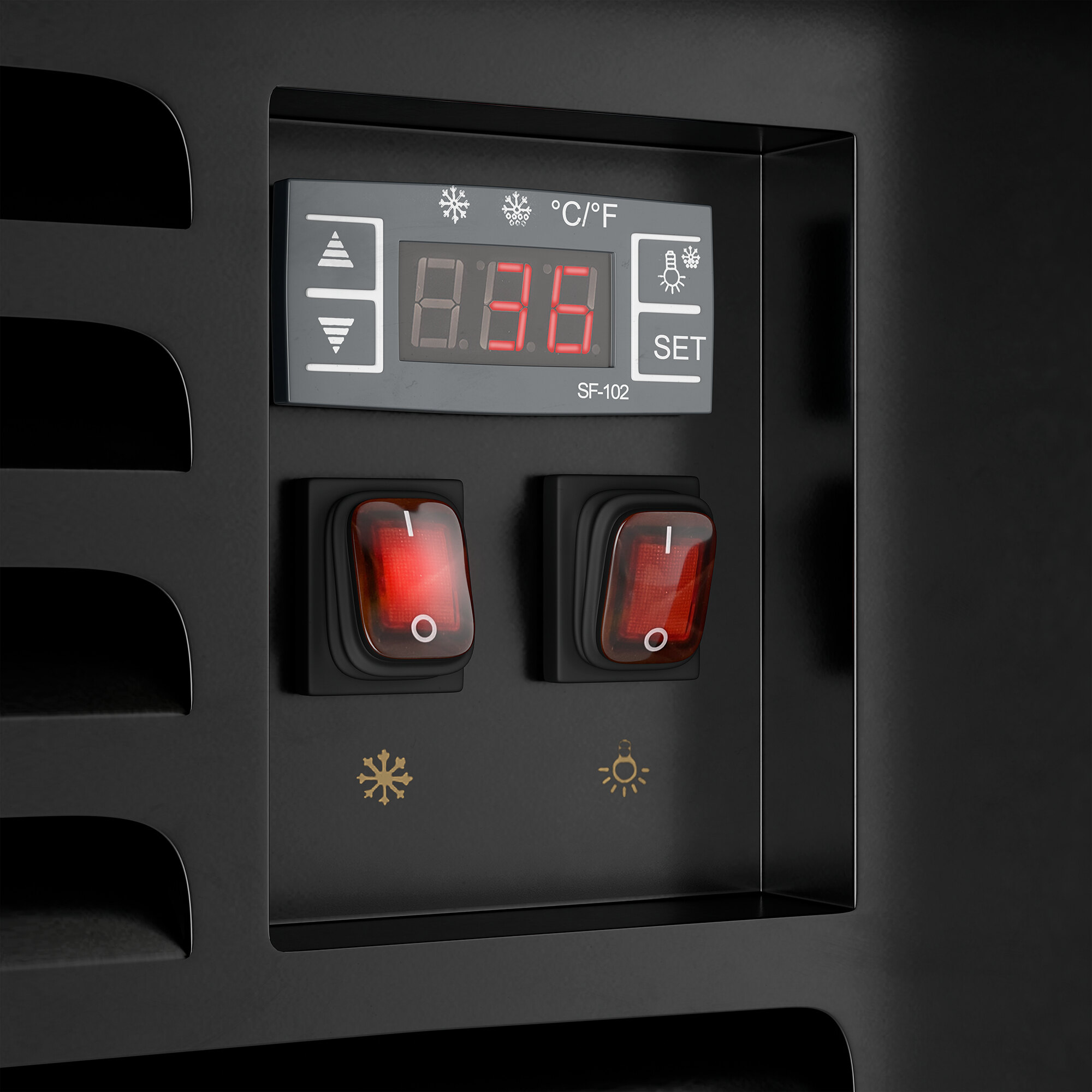 A close-up view of the control panel on a black refrigerated air curtain merchandiser, featuring a digital display and two red power switches.