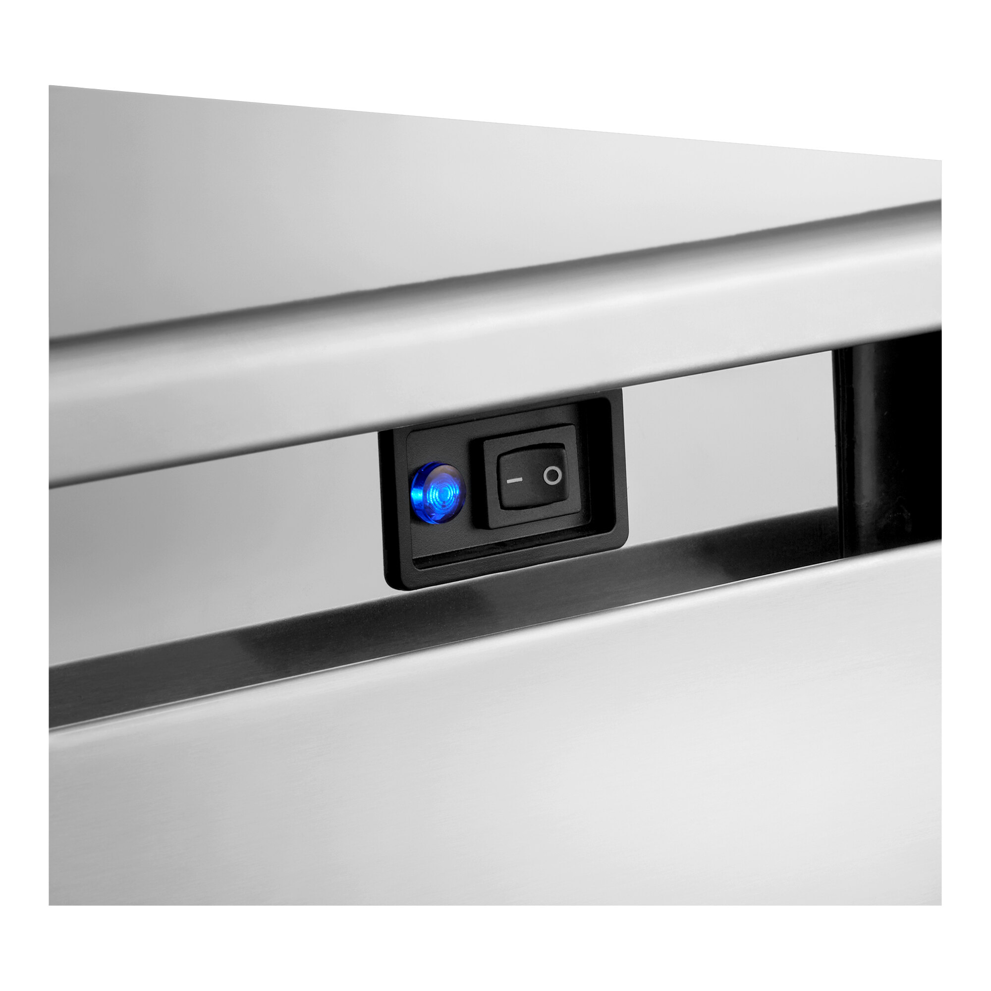 An air-cooled undercounter full cube ice machine with a control switch and indicator light on a stainless steel exterior.