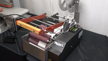 Tach-It LB-7 Automatic Bottle and Cylindrical Product Label Applicator Tach-It LB-7 Automatic Bottle and Cylindrical Product Label Applicator