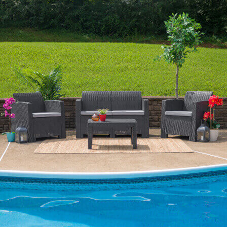 outdoor metal table and chair on landscaped patio