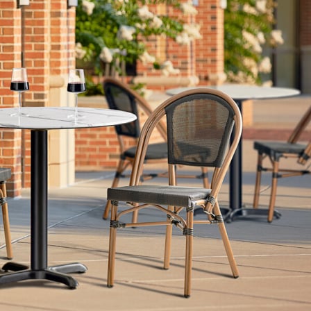 red outdoor chair on wooden deck