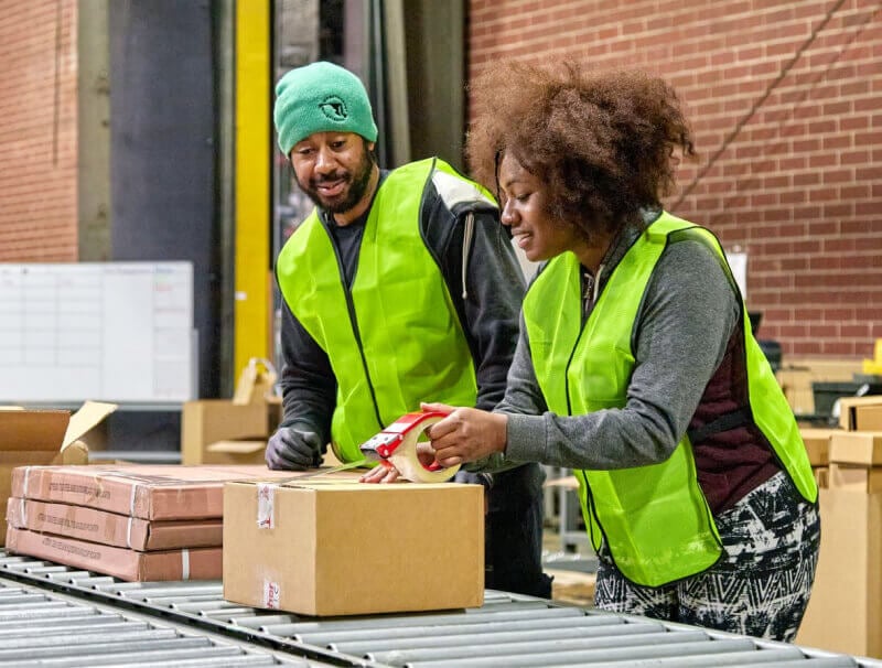 workers packaging products