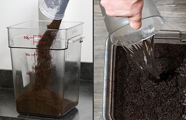 pouring coffee grounds and water into a bulk container