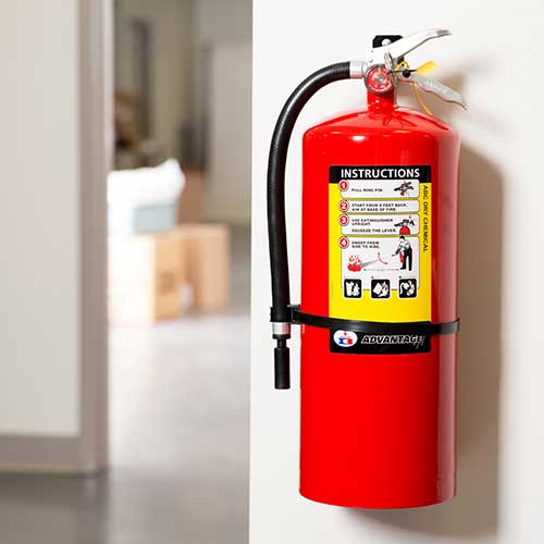 fire extinguisher on wall