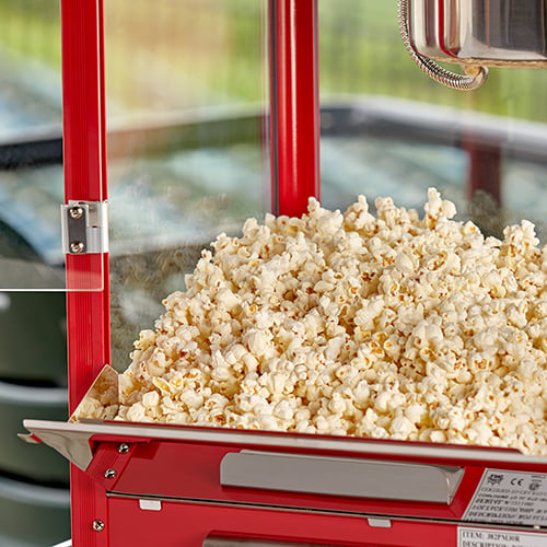 freshly made popcorn in popcorn machine