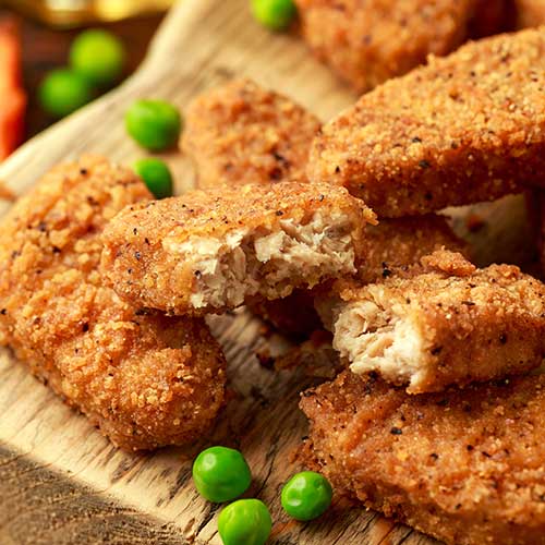 vegan southern style crispy nuggets served with sweet potato chips