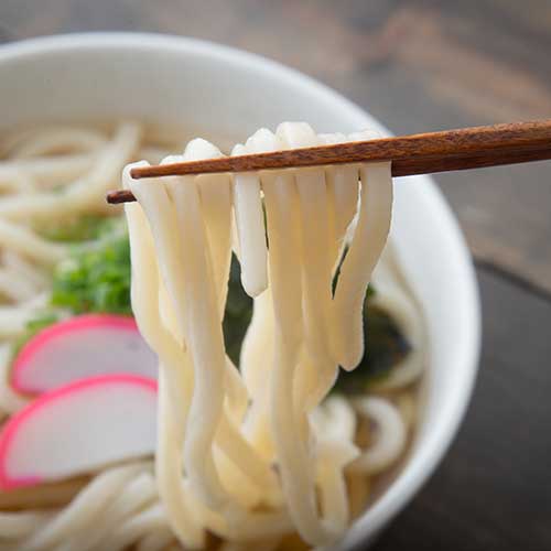 japanese udon noodle on chopsticks