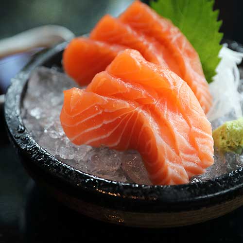 salmon sashimi on ice