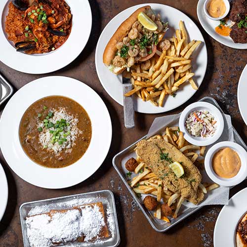 flat lay of cajun creole dishes at a New Orleans restaurant