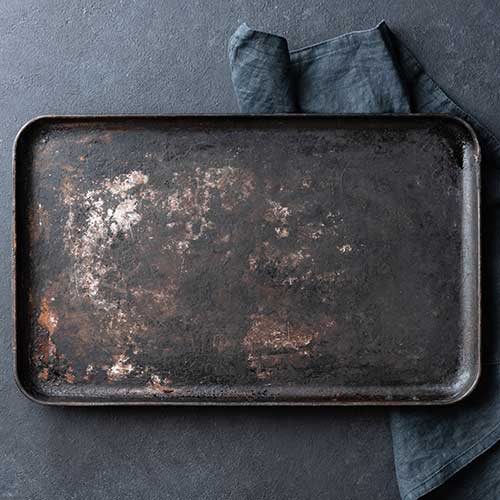 old rusty black baking sheet