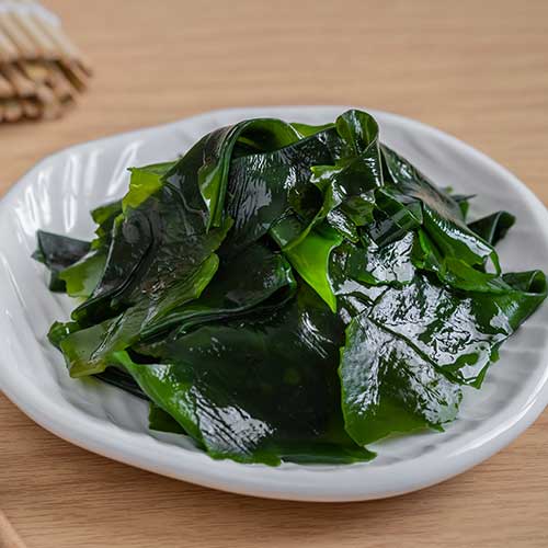 wakame seaweed on white plate