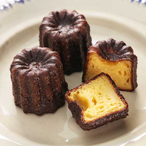 french traditional custard dessert cannele de bordeaux