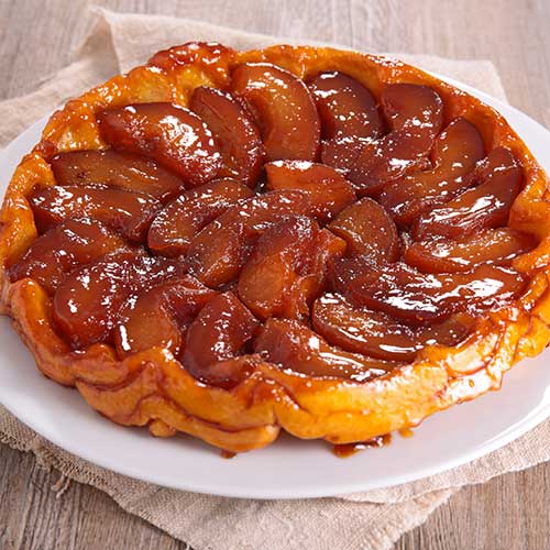 tart tatin on wooden background