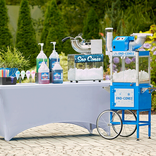 snow cone machine and table with snow cone syrups