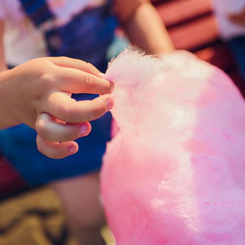 Girl Holding Pink Cotton Candy