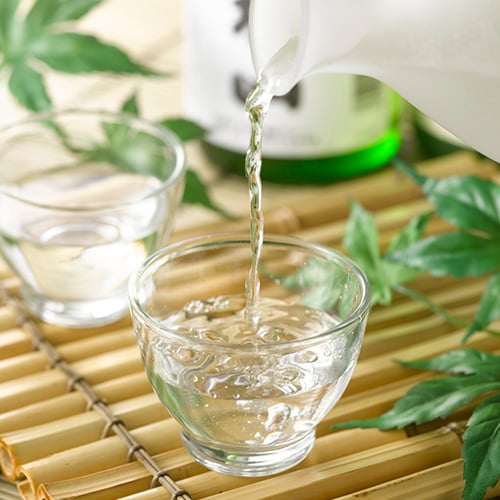 Sake being poured into a glass