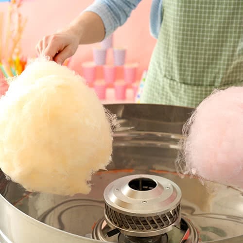 Woman Making Cotton Candy