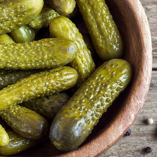 gherkins in a wood bowl