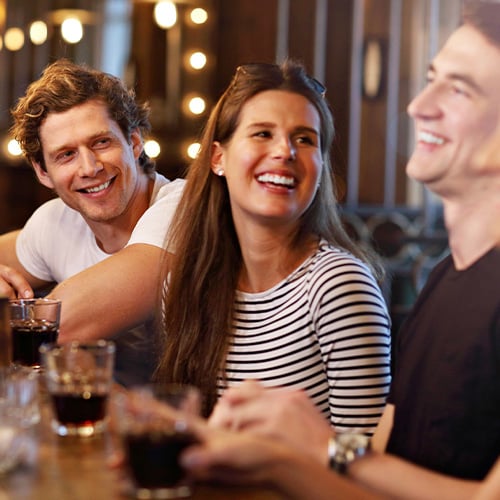 People at Table in Bar