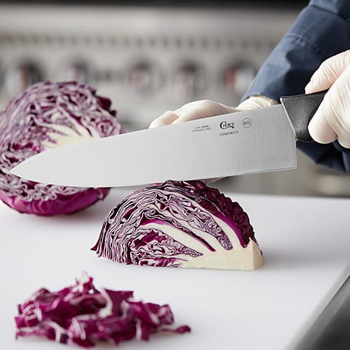 Knife chopping a cabbage