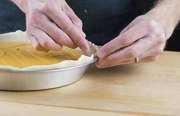 Crimp the pie crust edge and bake according to your recipe's instructions.