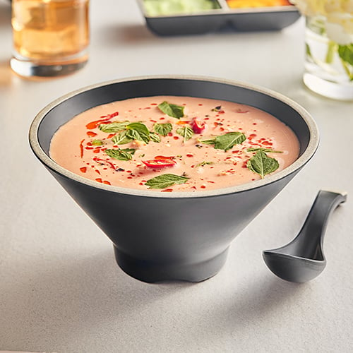 tomato bisque in black melamine tapered bowl