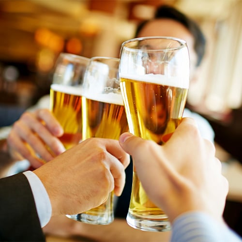 Group toast with beer glasses